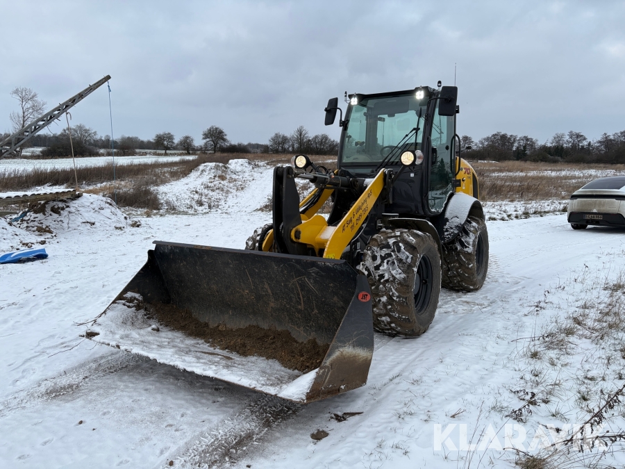 Gummiged New Holland W70c