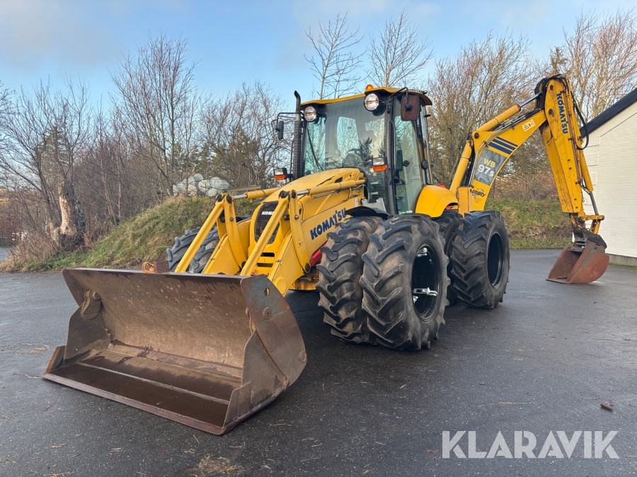 Rendegraver Komatsi WB97S-5 med tvillingehjul og tilbehør