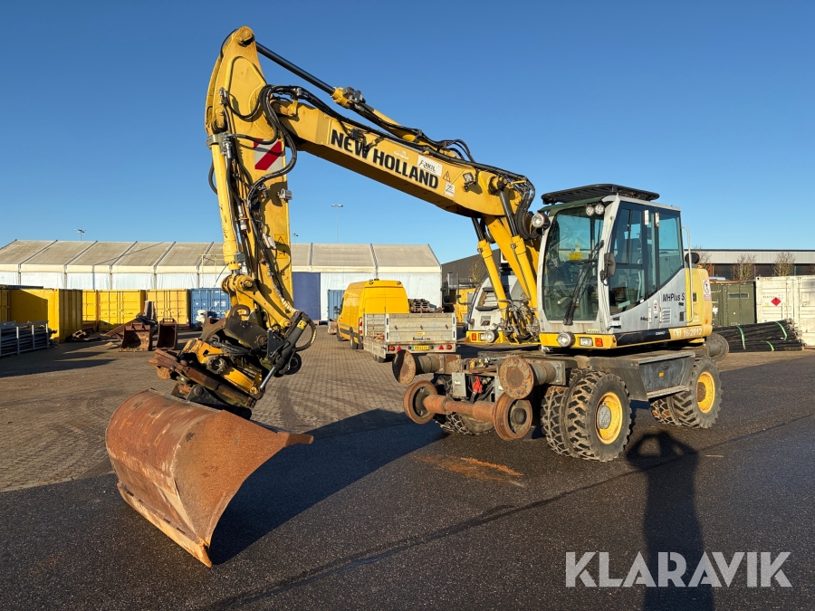 Hjulgraver New Holland 16/2012 skinnekørende med skovle