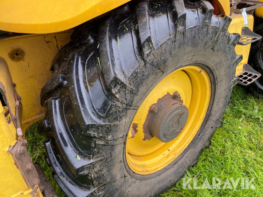 Rendegraver New Holland LB115.B