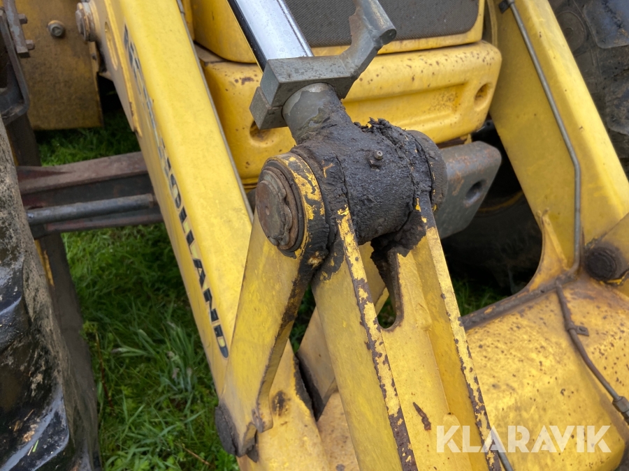 Rendegraver New Holland LB115.B