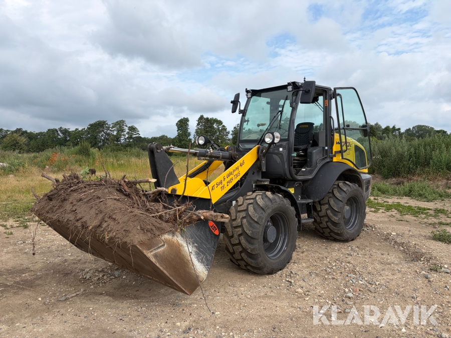 Gummiged New Holland W70C