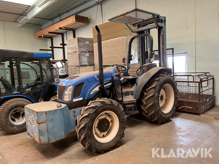 Traktor New Holland TN60A med byggelift