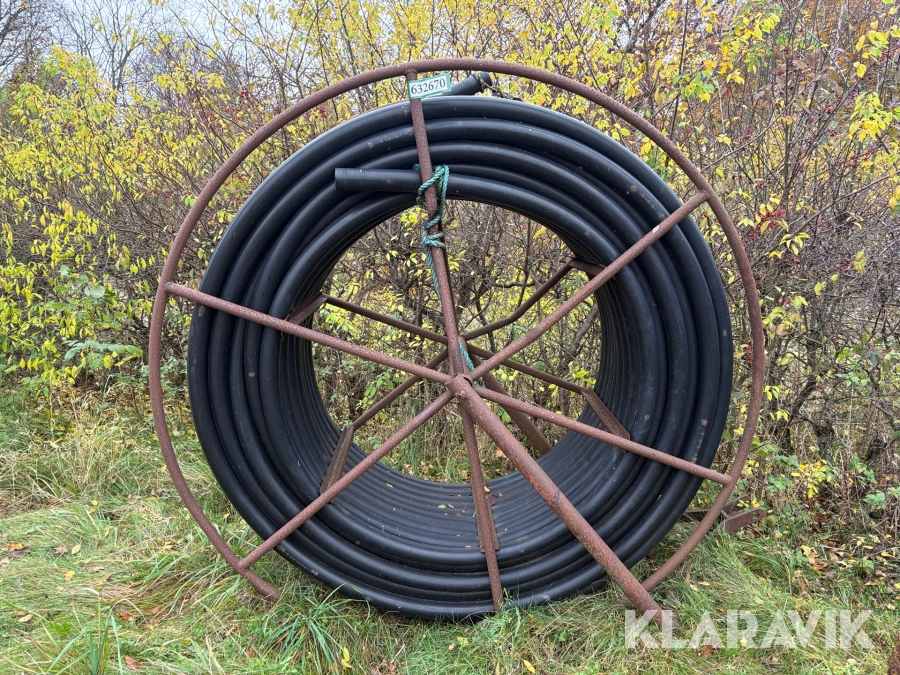 Slange til vandingsanlæg på oprul